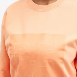 P.E Nation Cut Shot Crew Sweat 11 P.E Nation Cut Shot Crew Sweat -Vibrant Vogue 12 01 2024 LB 234F190 ORGL 9 1